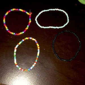 Four beaded brackets